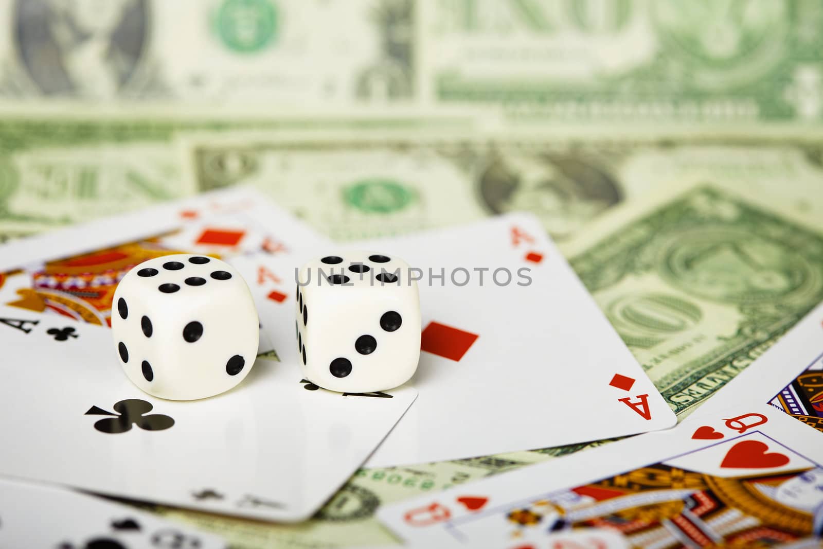 White dices are on the cards and money