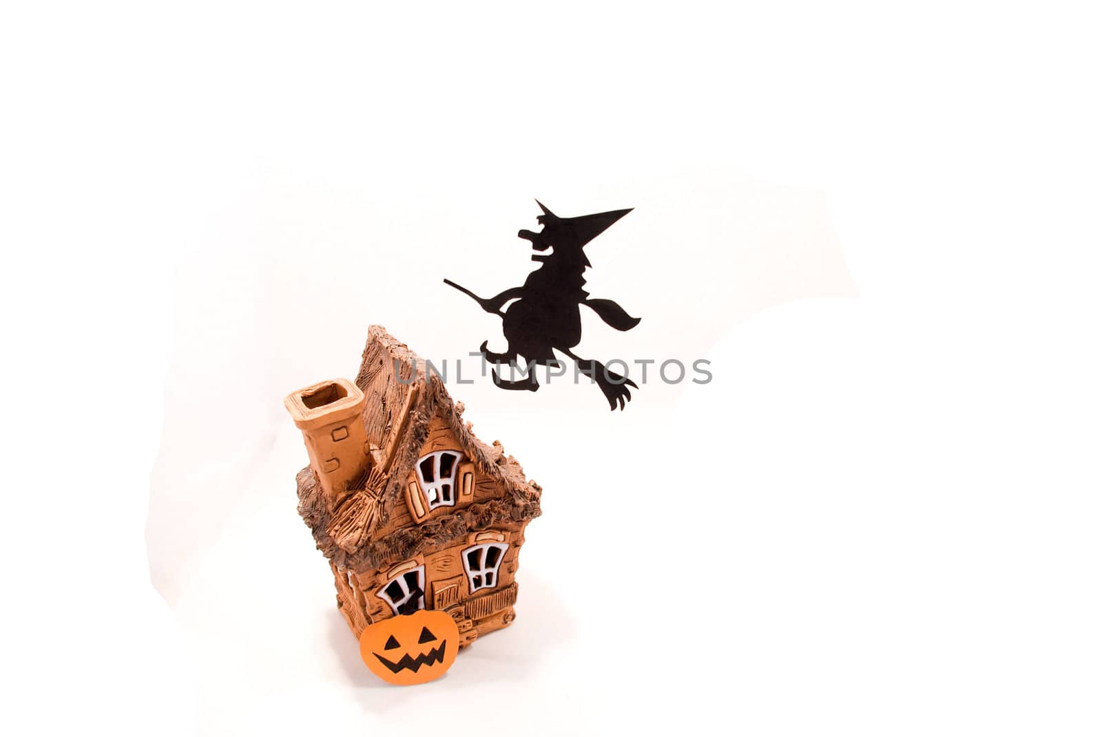 Witch,flying on broom on house,on white background by jannyjus