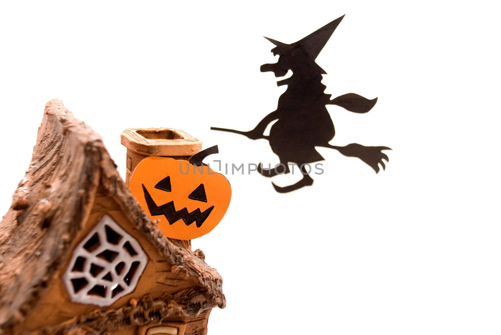 Witch,flying on broom on house,on white background by jannyjus