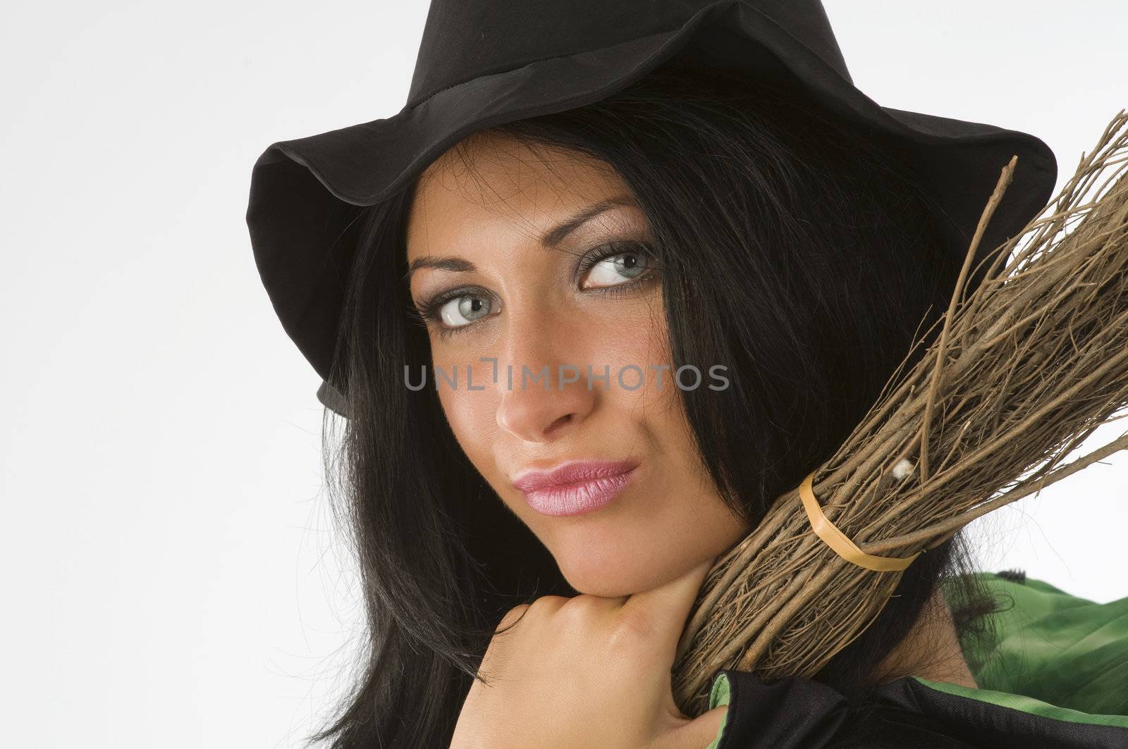 close up of a cute witch with hat and blue eyes