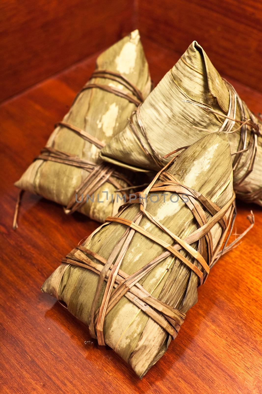 Rice dumplings on wooden background