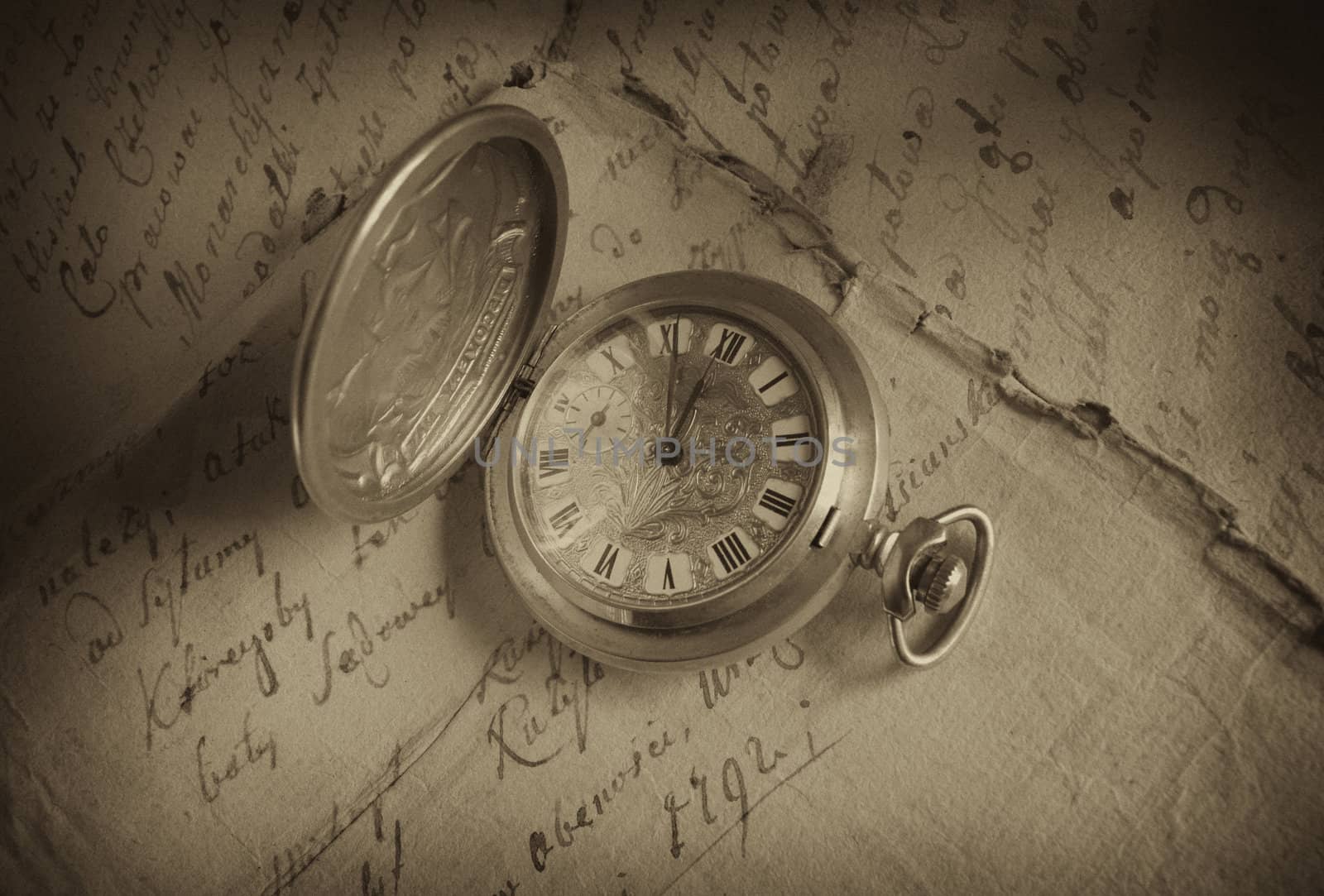 Old-time watch,current of time,tone sepia