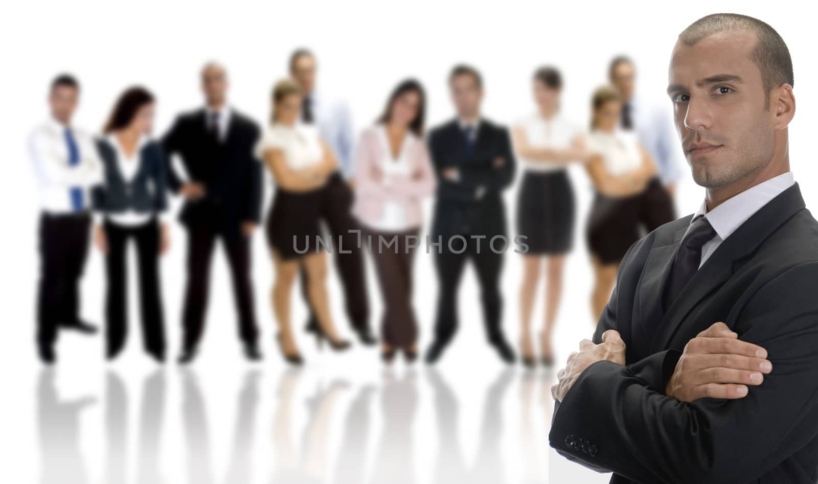 handsome businessman with large group