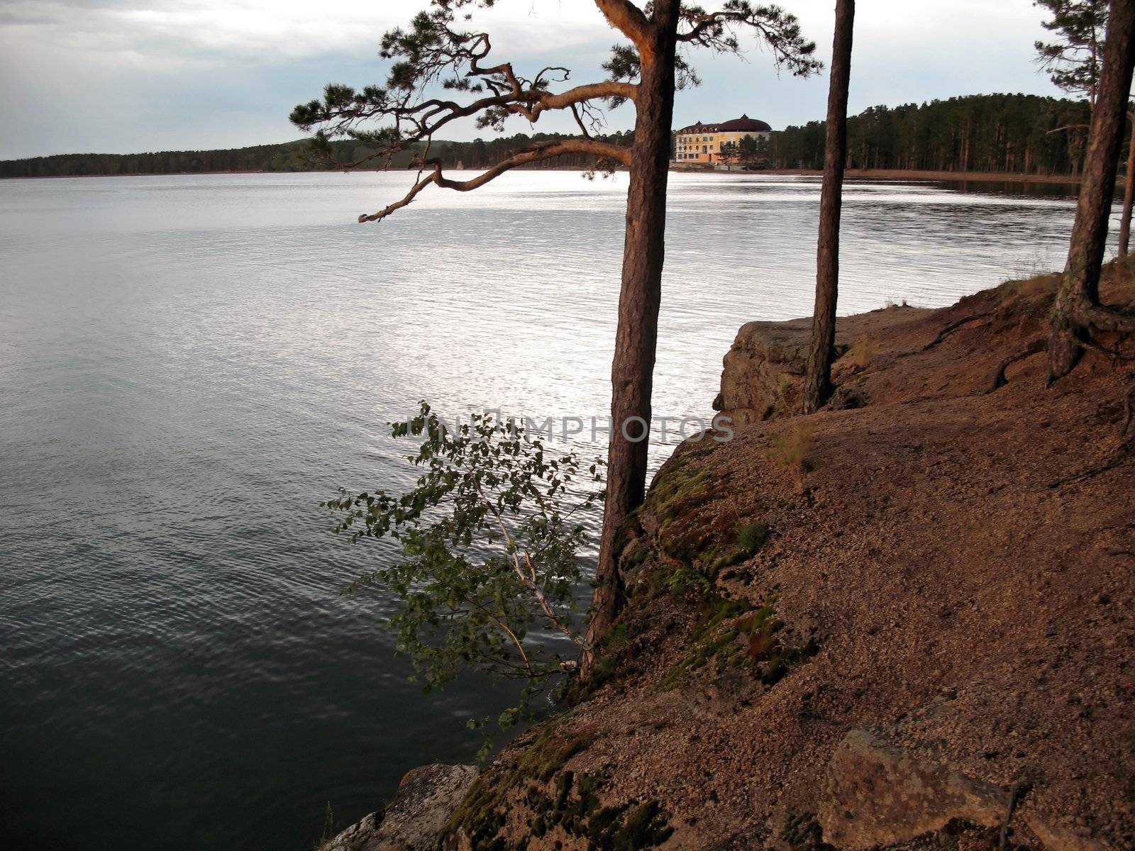 Rocky coast of lake by tabis