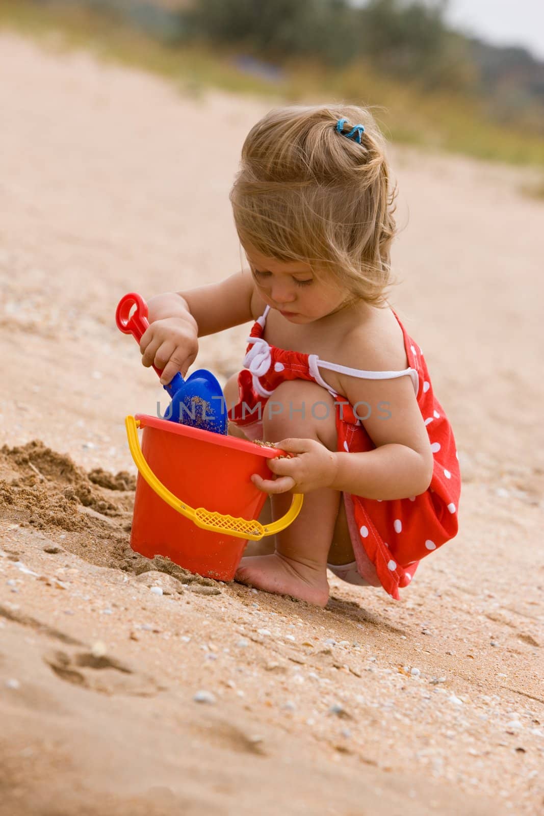 people series: little girl play with sand