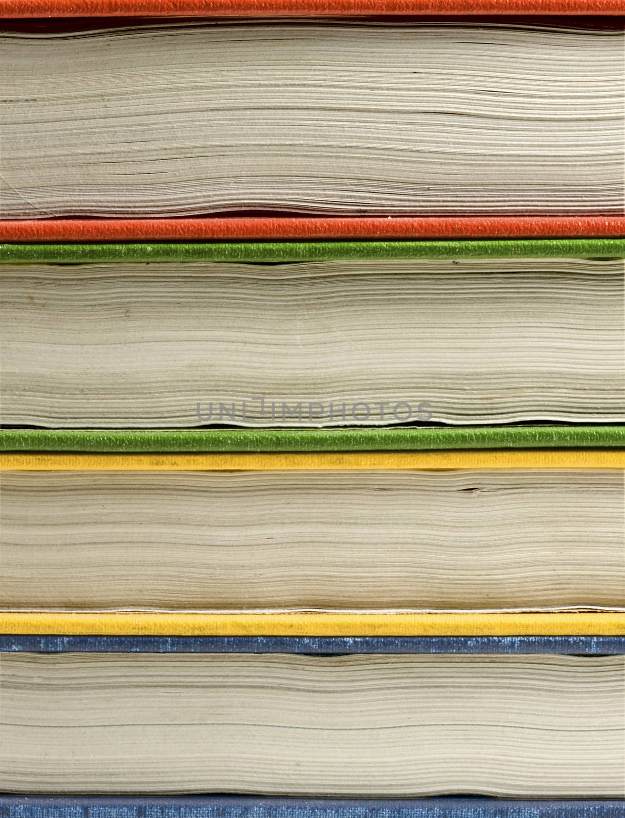 Multi colored old books background