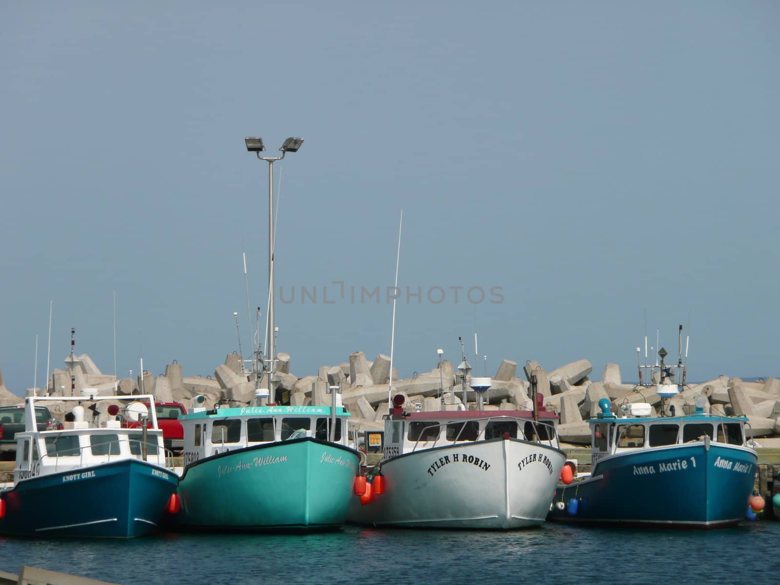 Colorful fishing boats by pucepitou