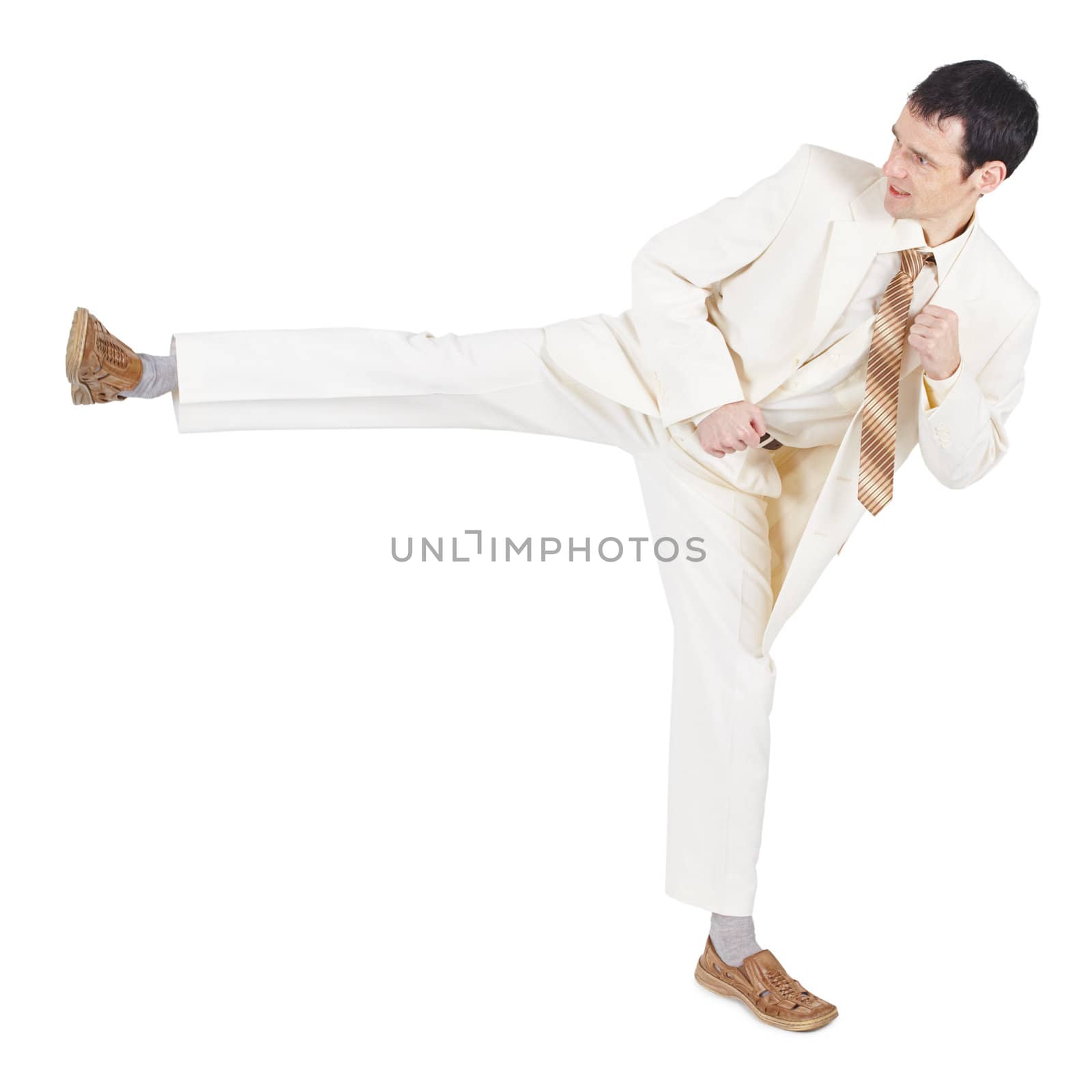 The man in a light suit beats a foot, is isolated on a white background