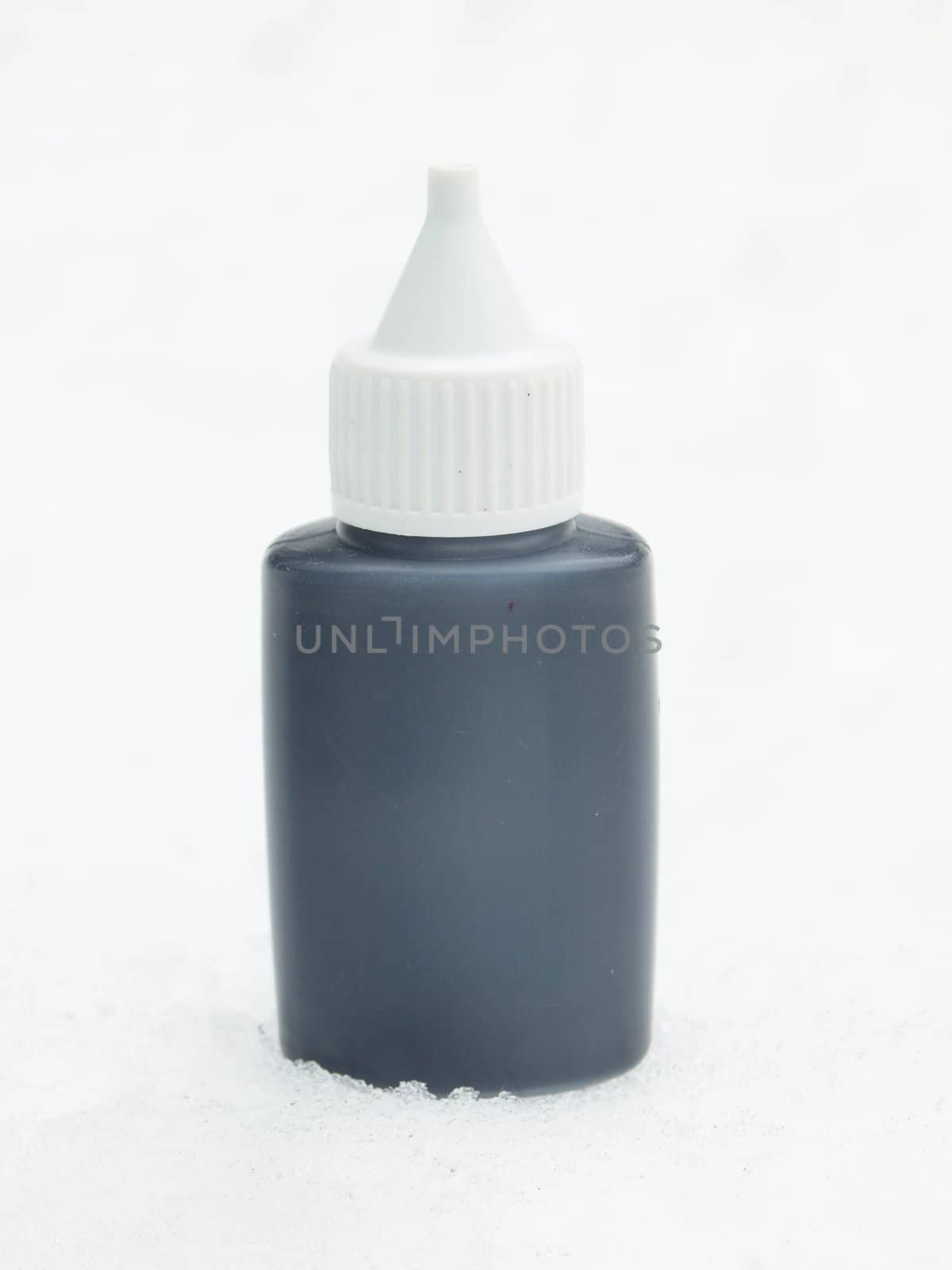 Black tube on a snow in the winter 