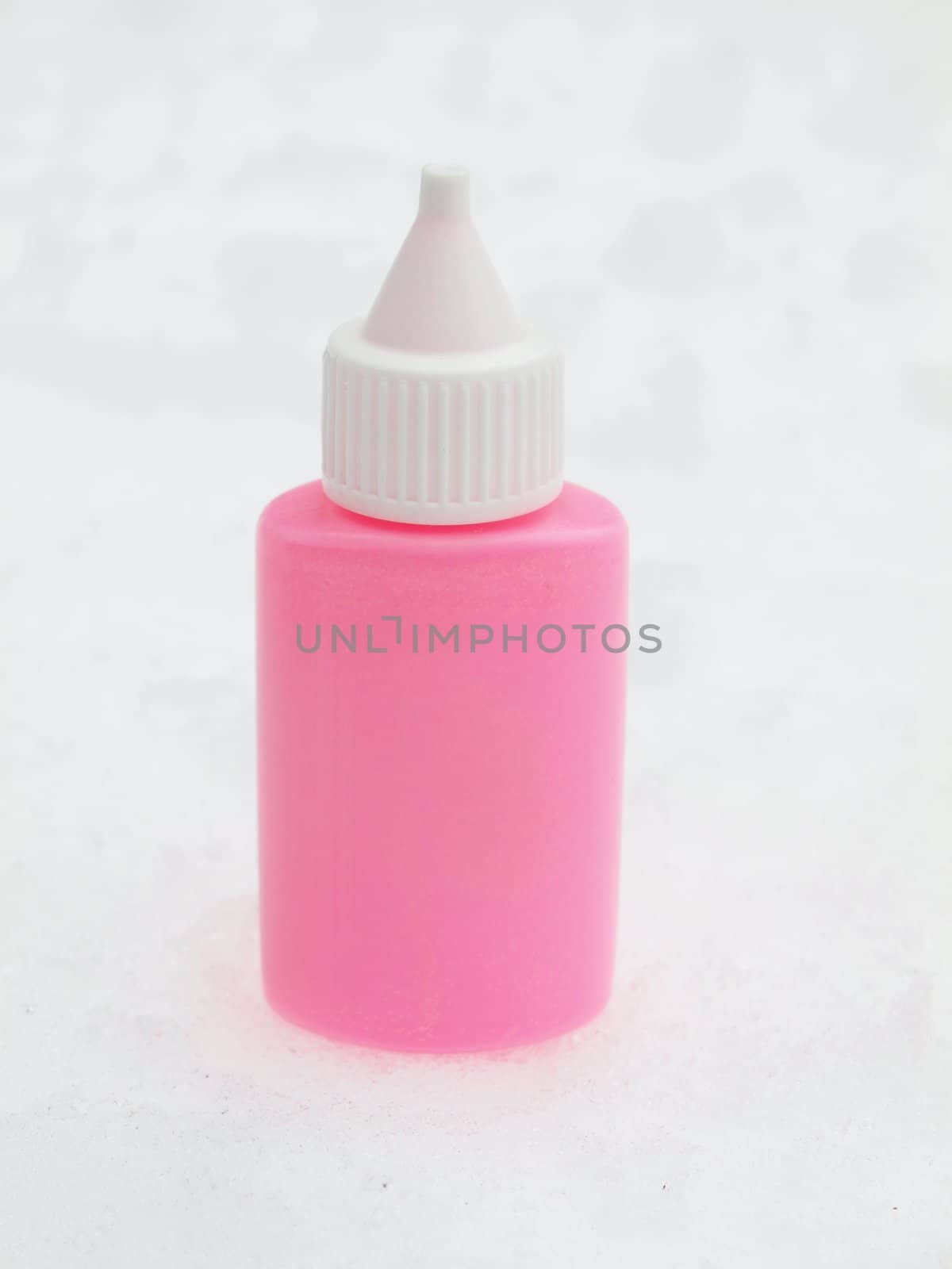 Pink tube on a snow in the winter      