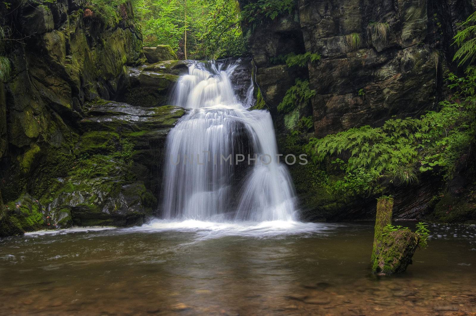 Shot of the fall of water.
Stream Huntava - natural area - nature preserve.
Resov, Czech republic, Europe.