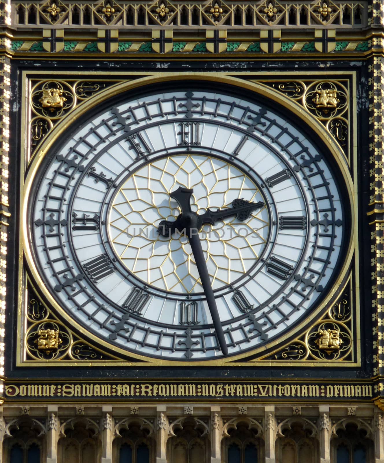 A close up of the clock face on the tower that contains Big Ben in London.