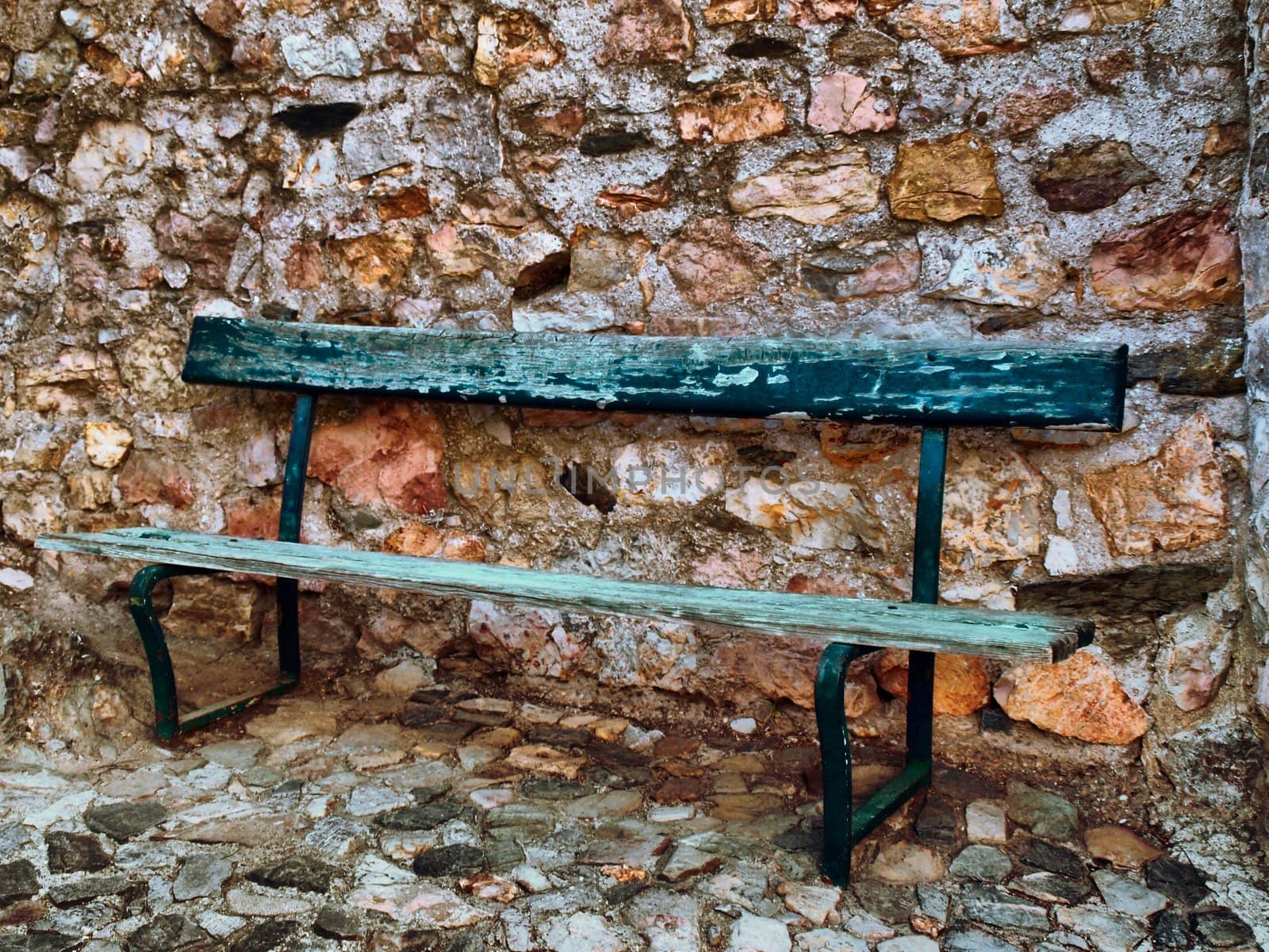 image of a green old wooden bench