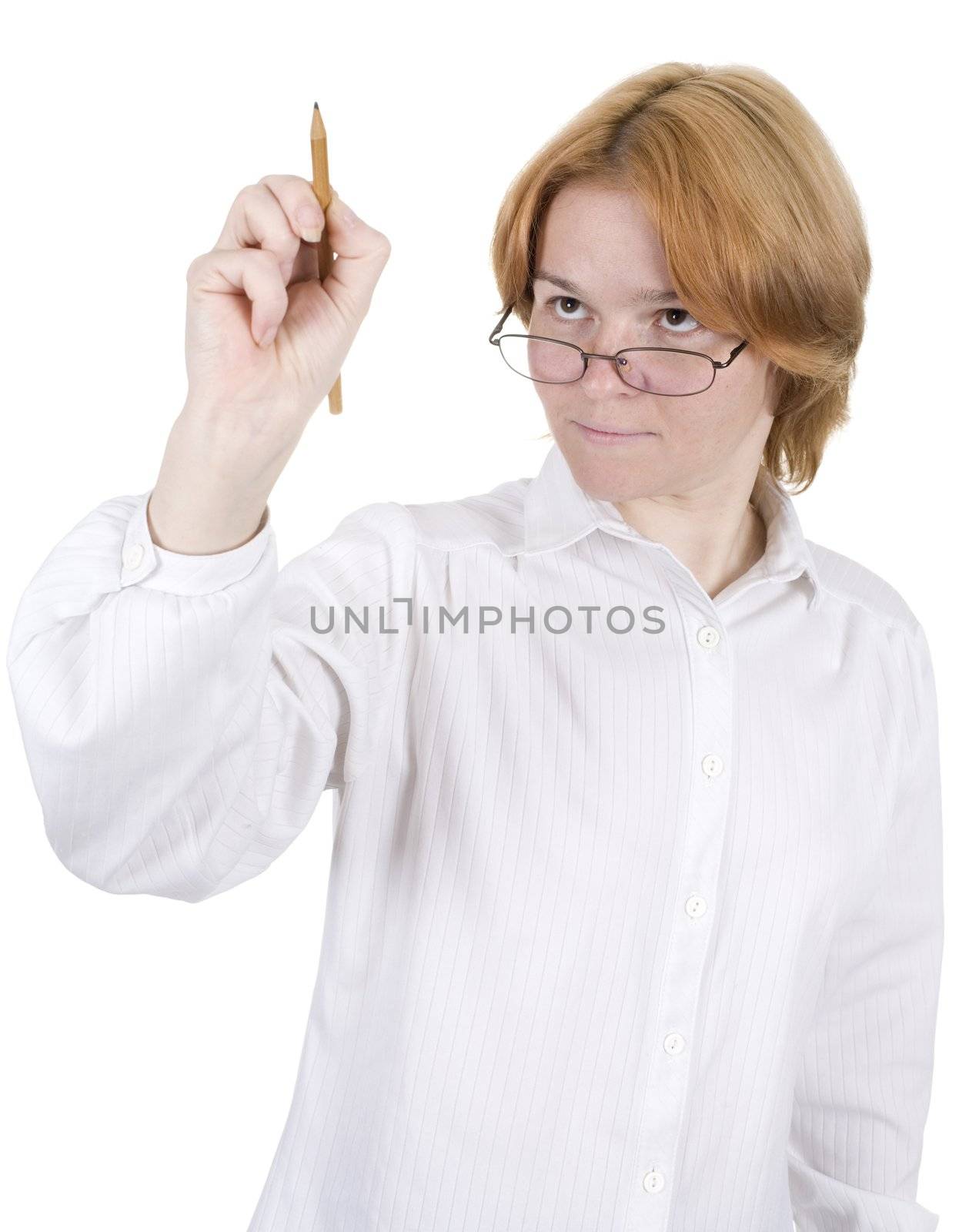 The girl in white clothes draws on glass