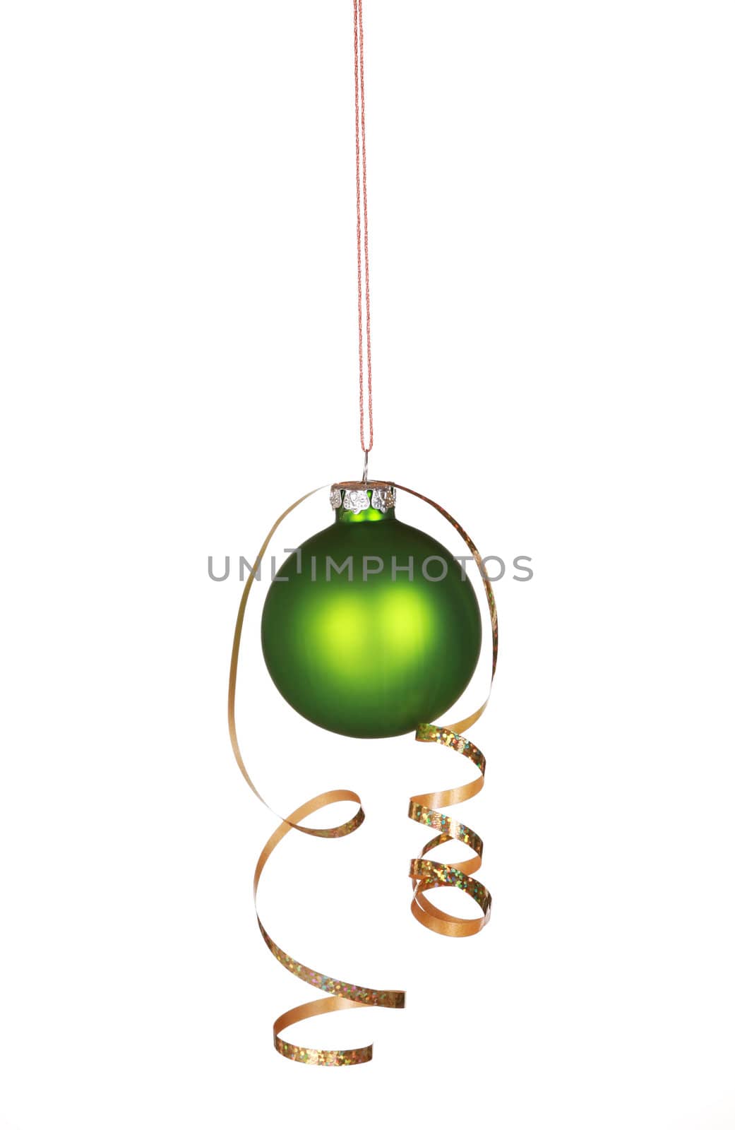 Beautiful green ornament hanging with curly ribbon