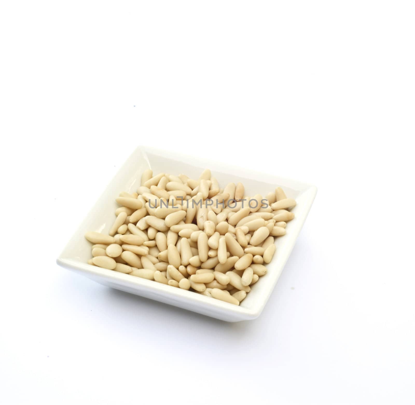 Small basket with bread, basil, pine nuts and parmesan