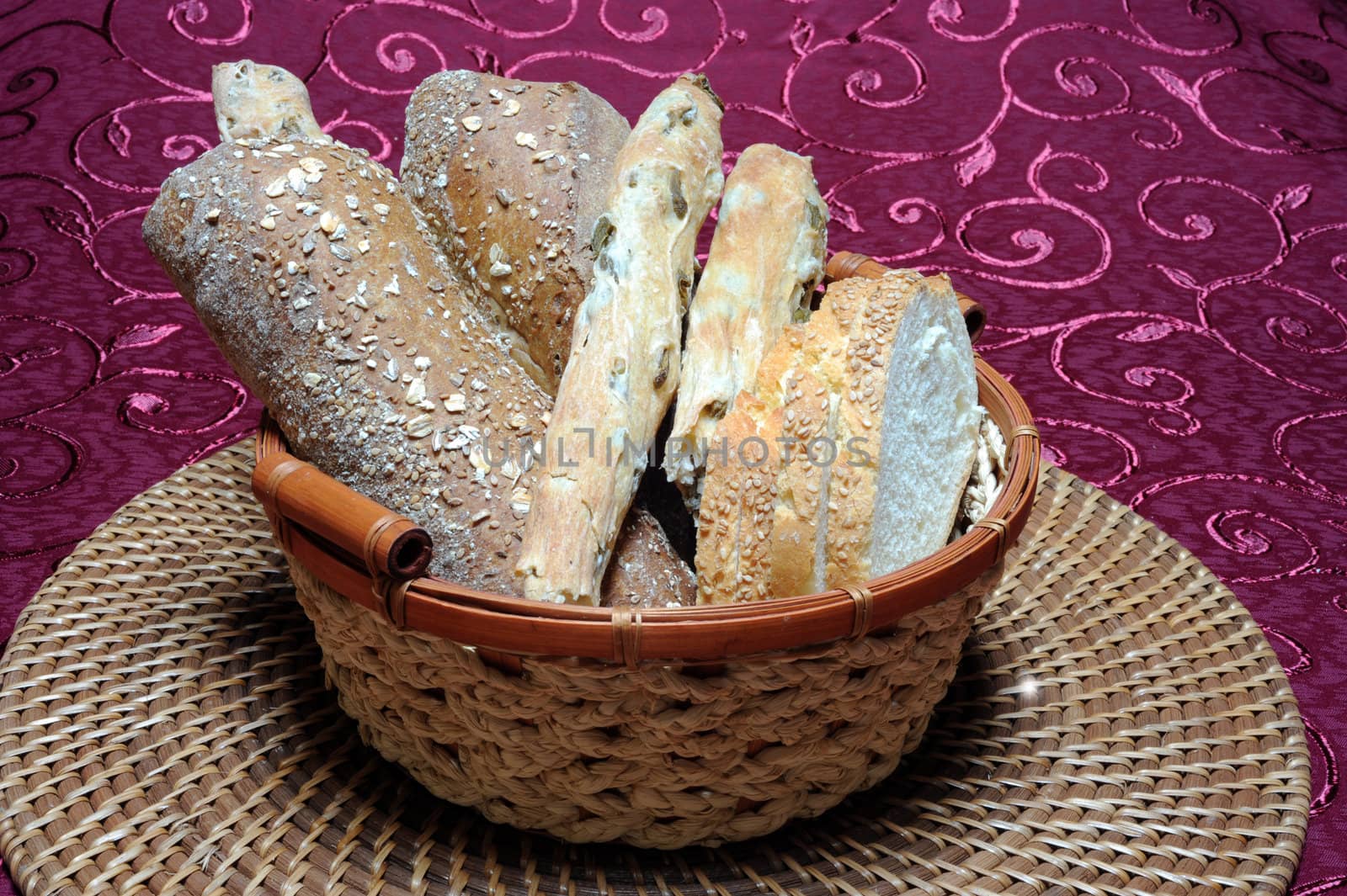 bread types and shapes on dark red background