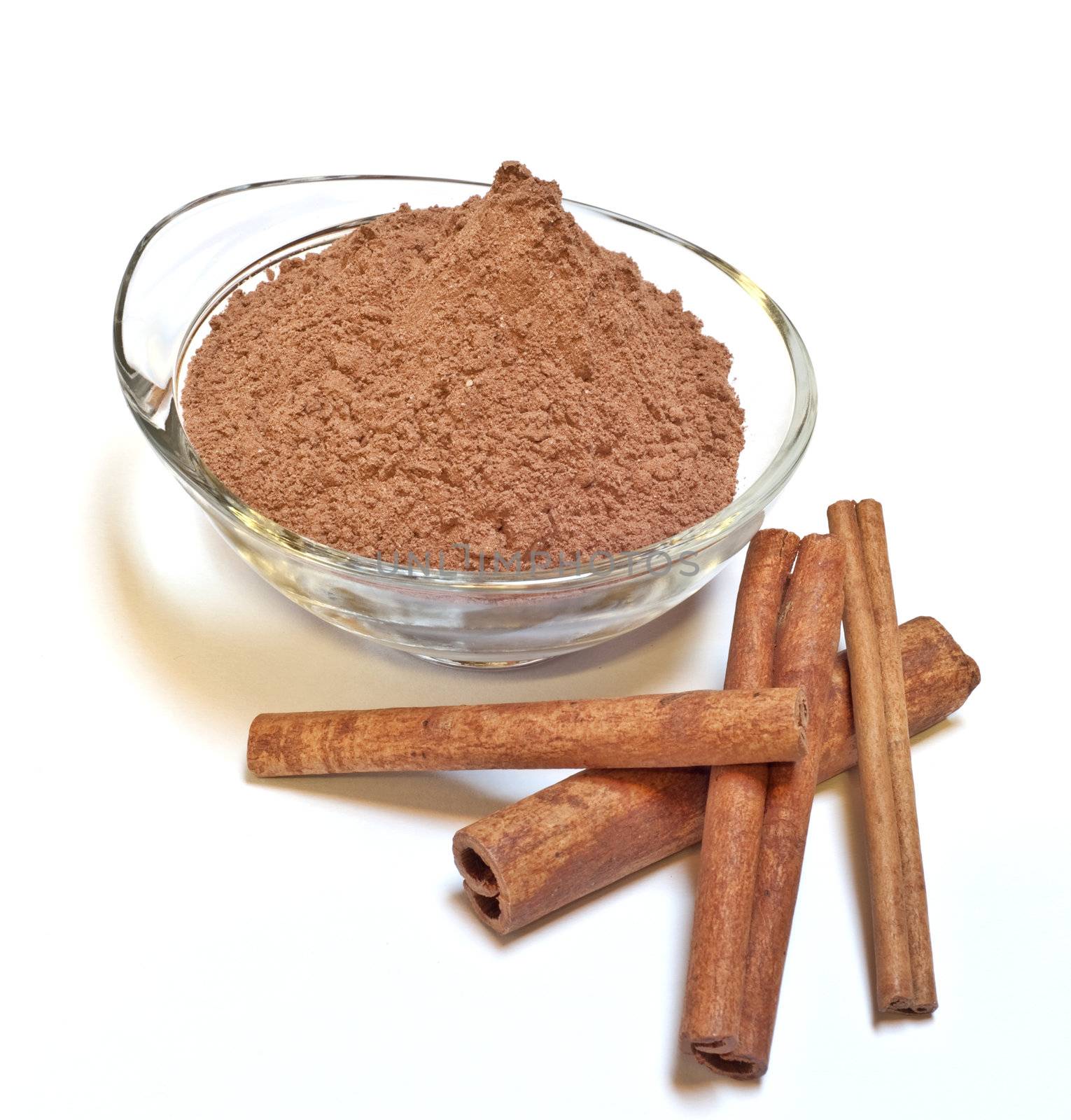 sweet cocoa and cinnamon on a white background