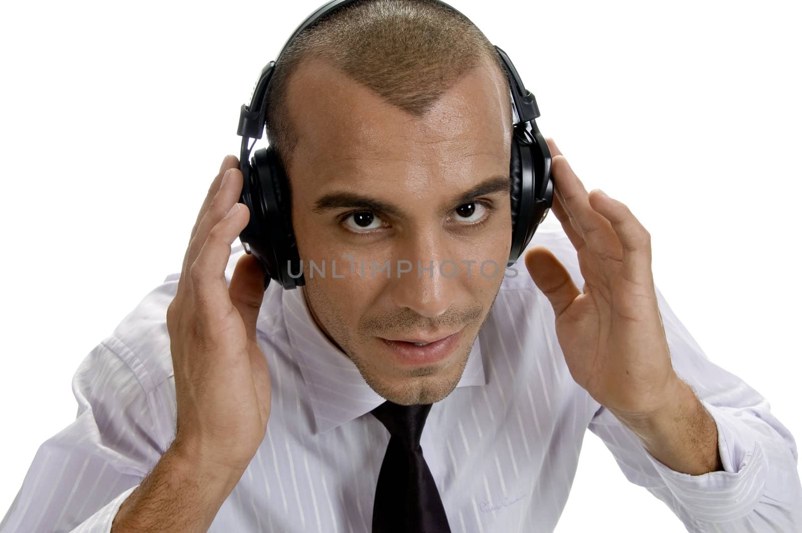 businessman looking into camera on an isolated background