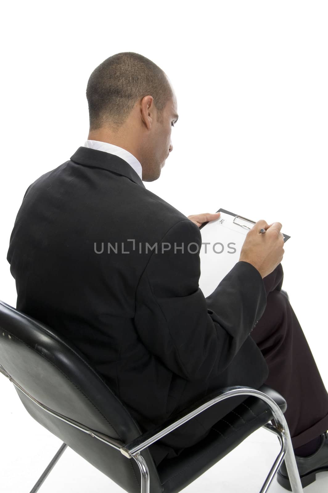 businessman posing from behind with white background