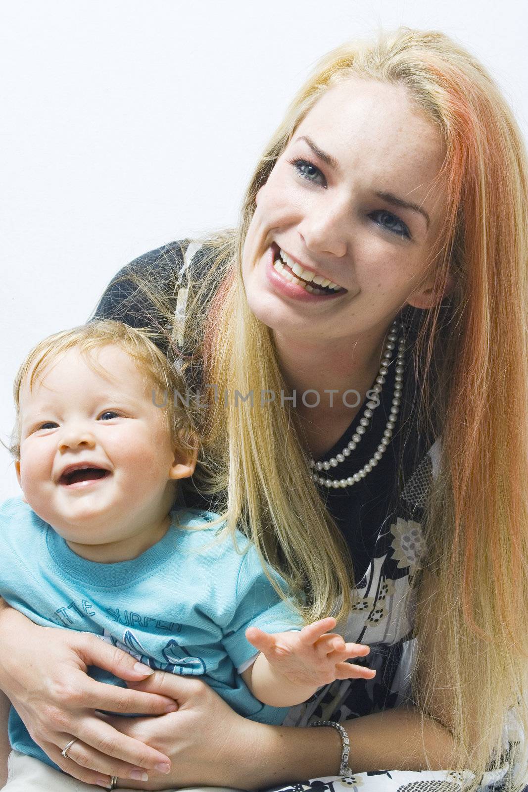 Model poses with her son and both enjoying the moment.