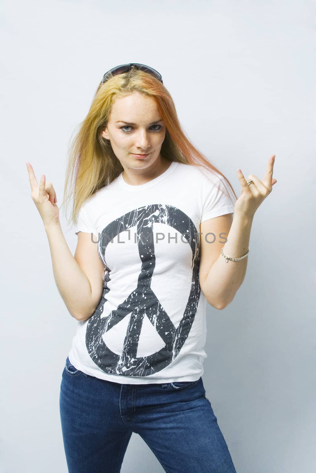 Model advertises for peace with the love hand sign.