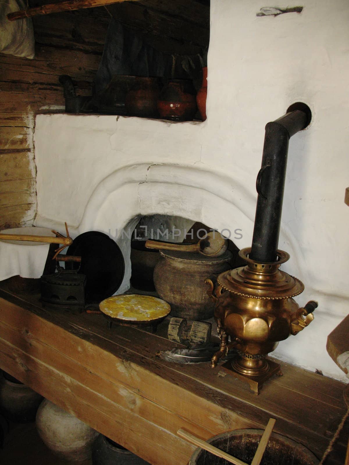 Kitchen utensils in ancient russian stove in Novgorod Russia