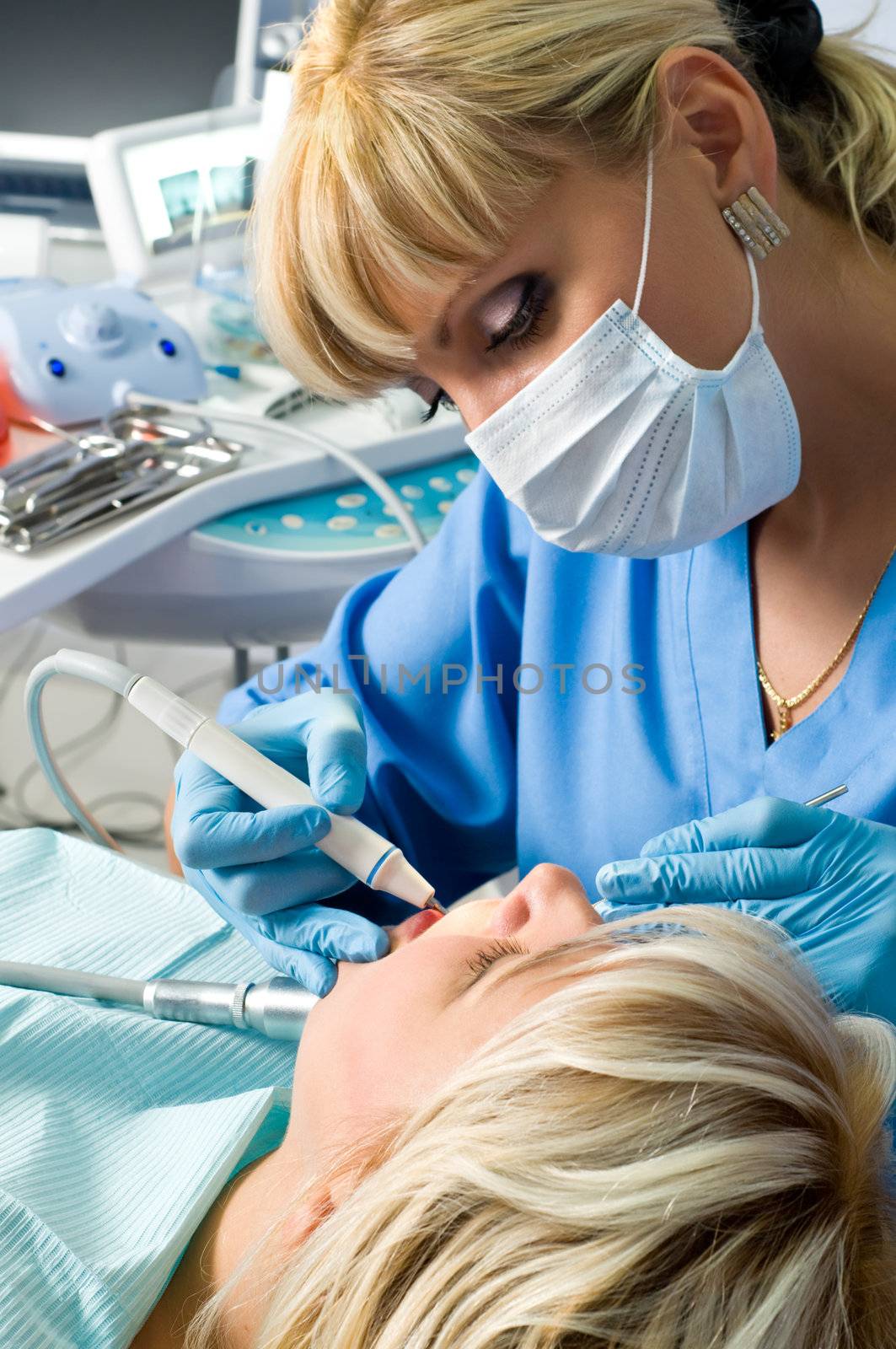 dentistry, doctor and patient, drilling the tooth