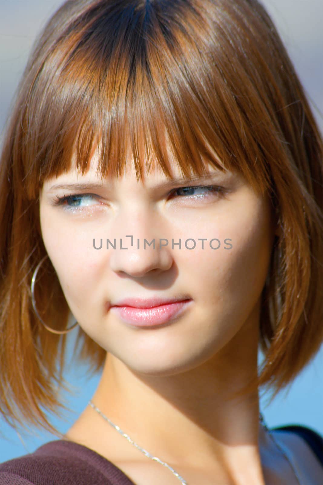 Portrait of the beautiful young girl