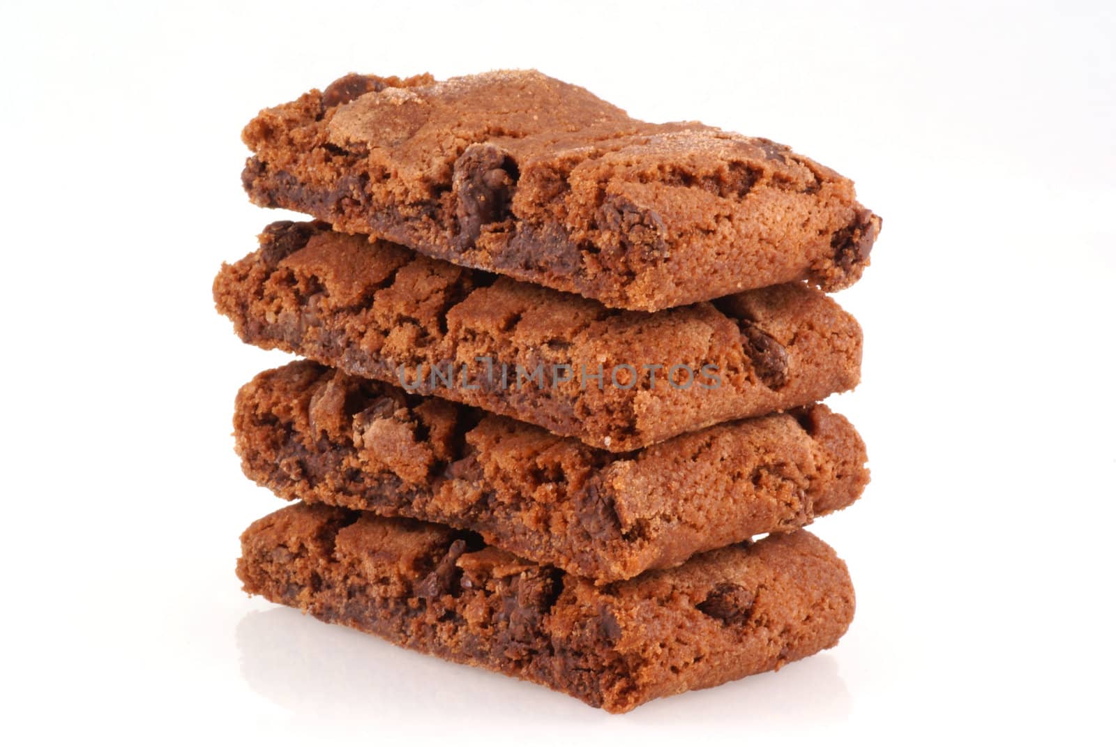 Pile of chocolate brownie cookies on a white background.