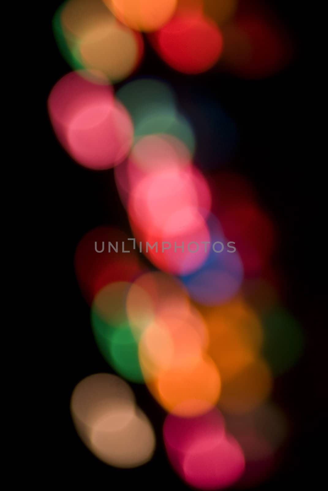 a colorful background of out of focus light (bokeh) circles