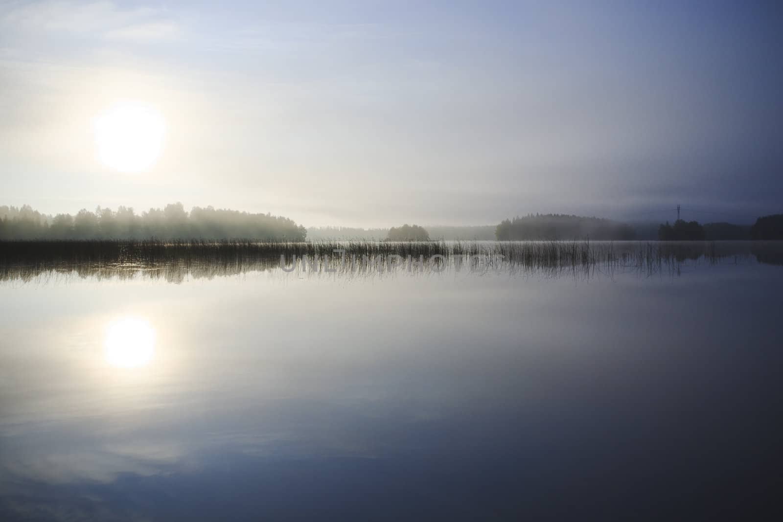 Sunrise at the lake in eastern part of Finland