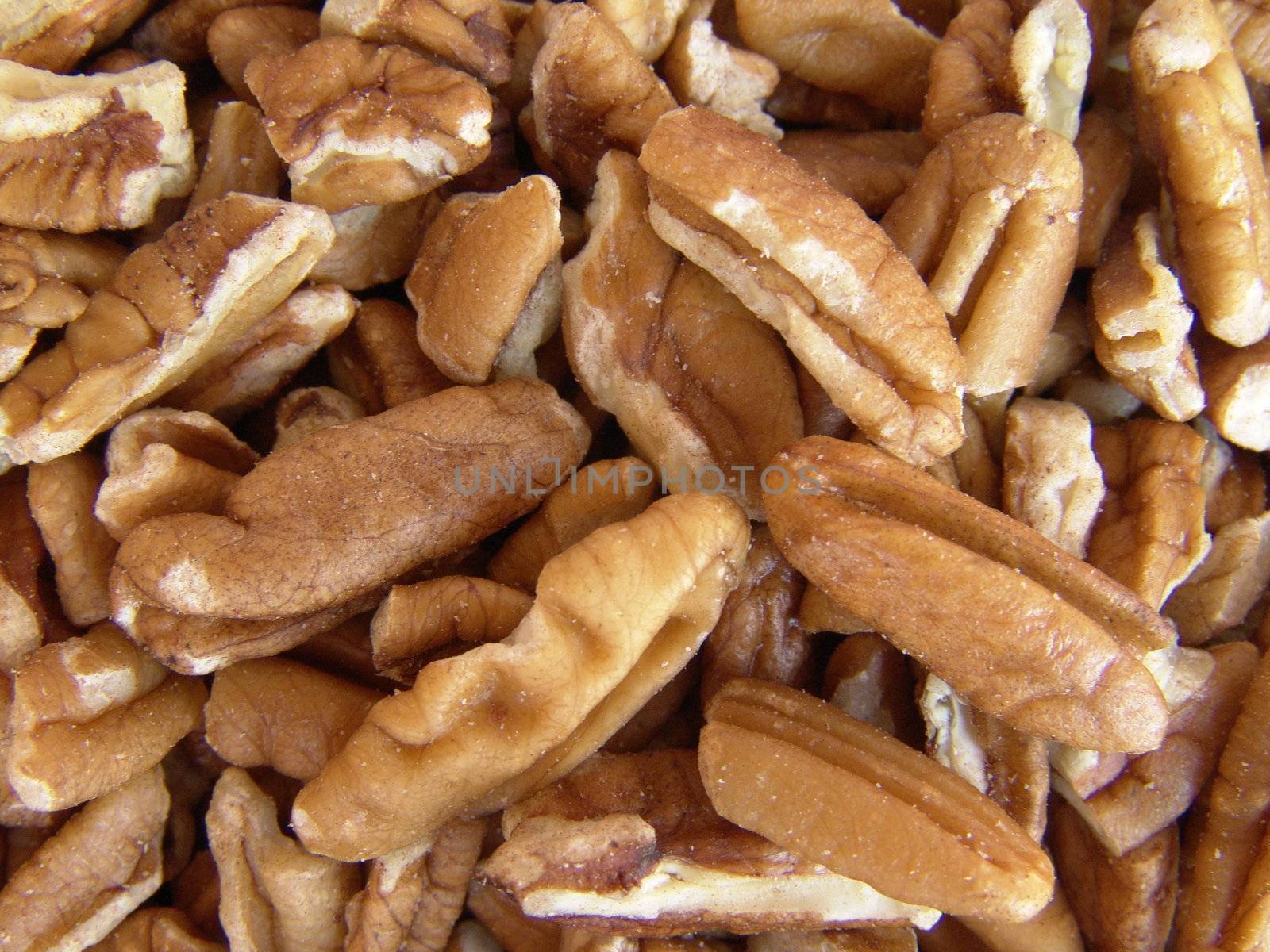 Close up on raw shelled pecan nuts