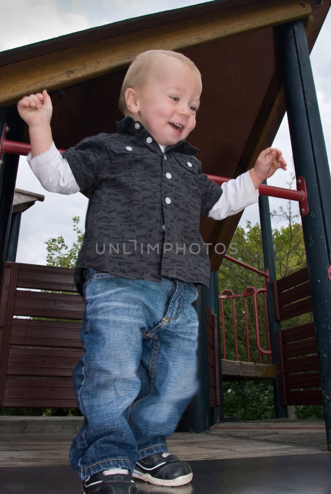 a little boy having fun at the playground 