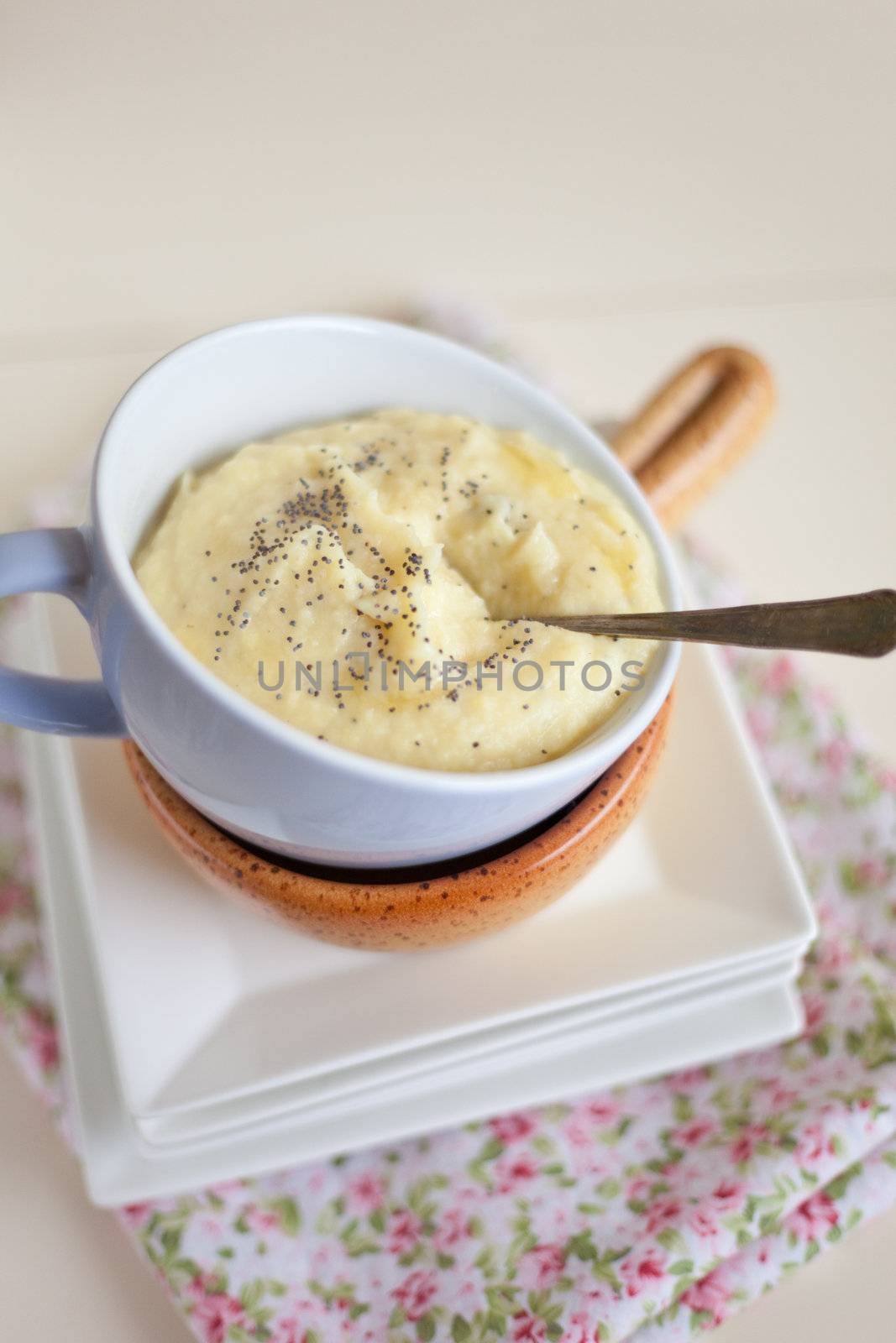 Soup with apple and celeriac served in a small bowl