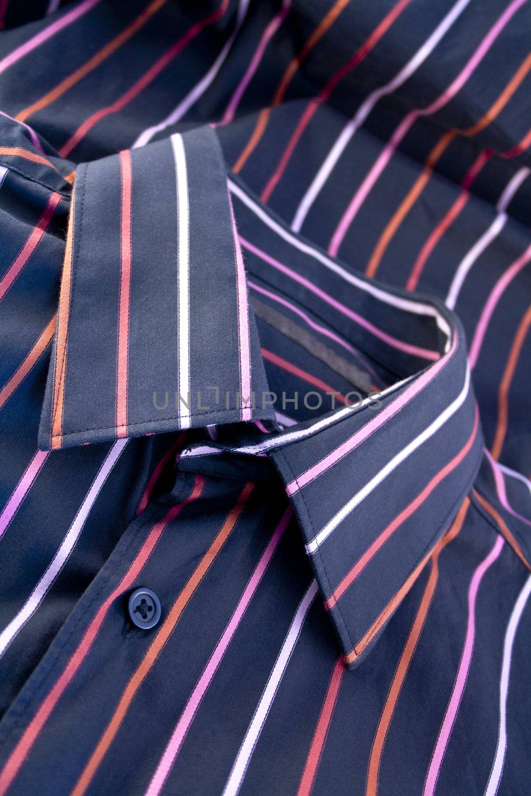 Details of the male black shirt with colorful lines