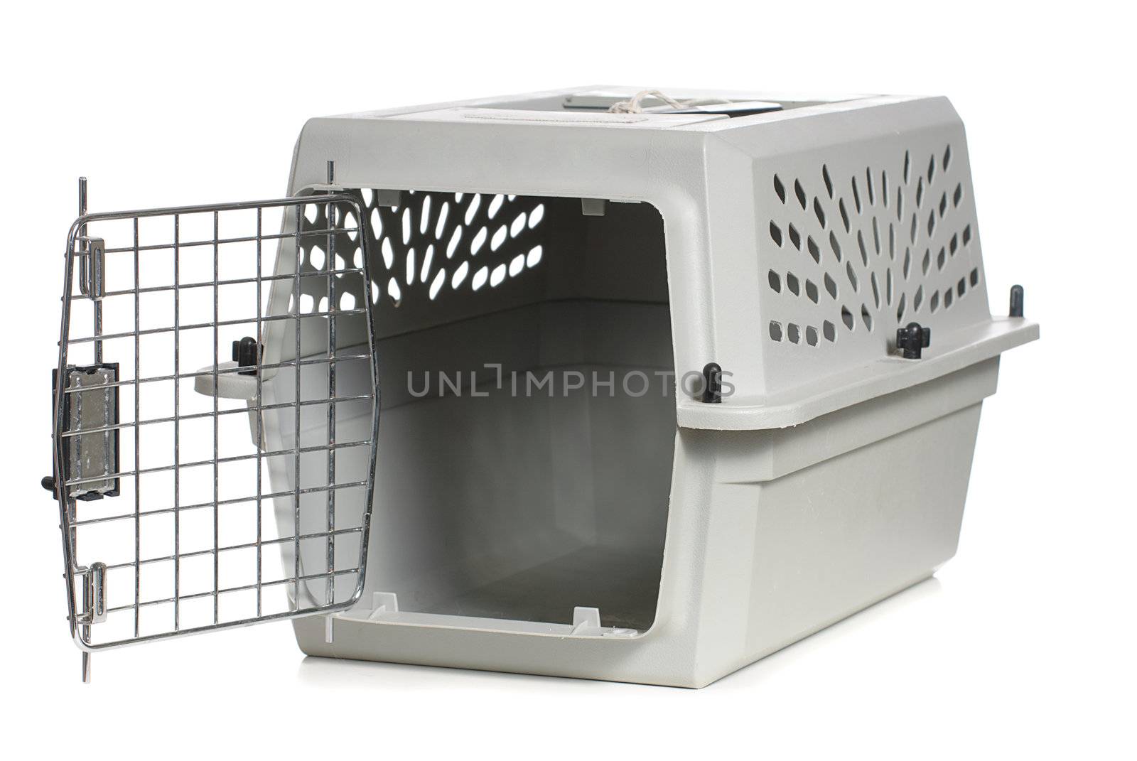 A grey cat carrier with the door open, isolated against a white background.