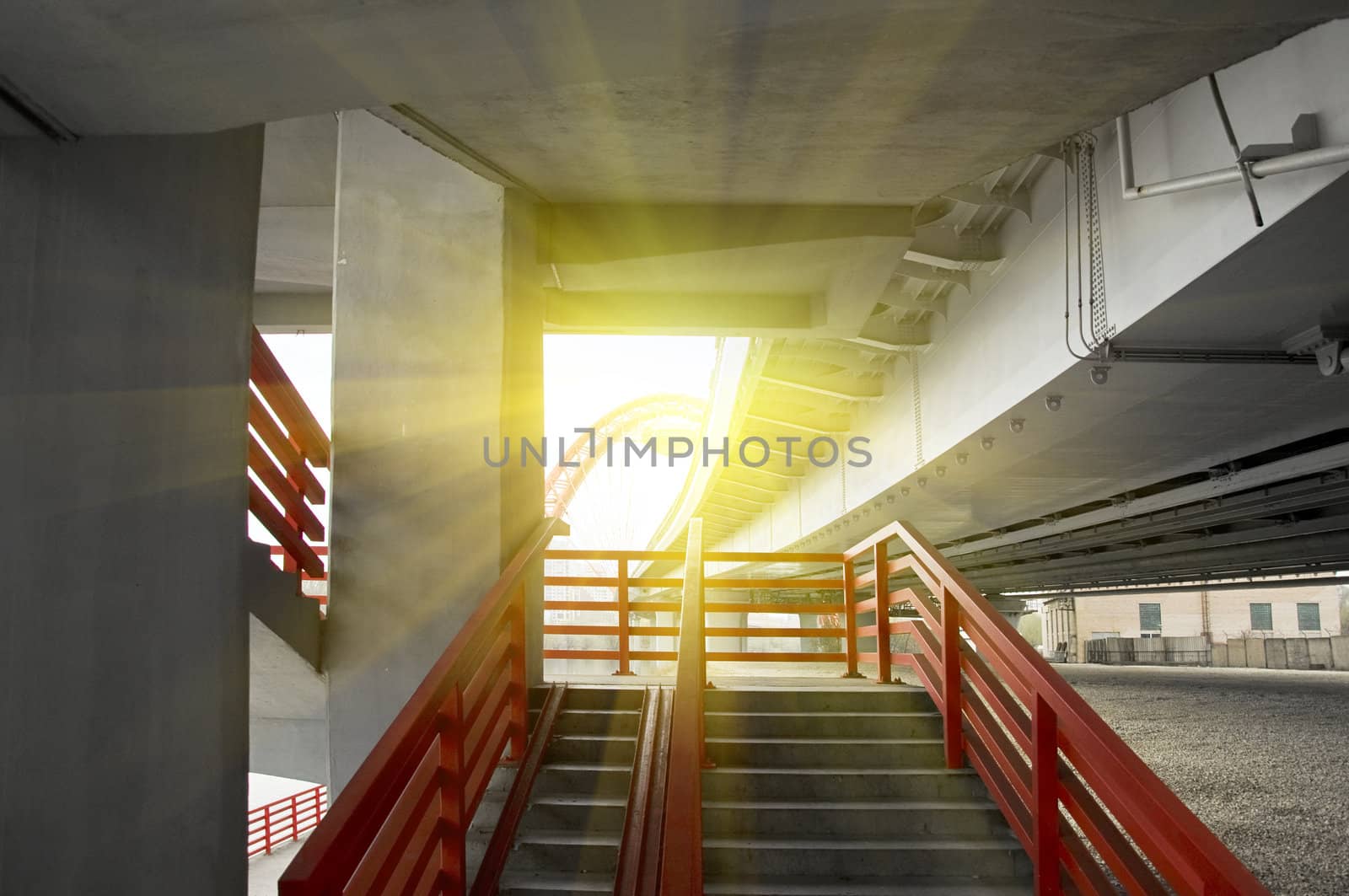 view on the Stairway under concrete road bridge with column in Moscow