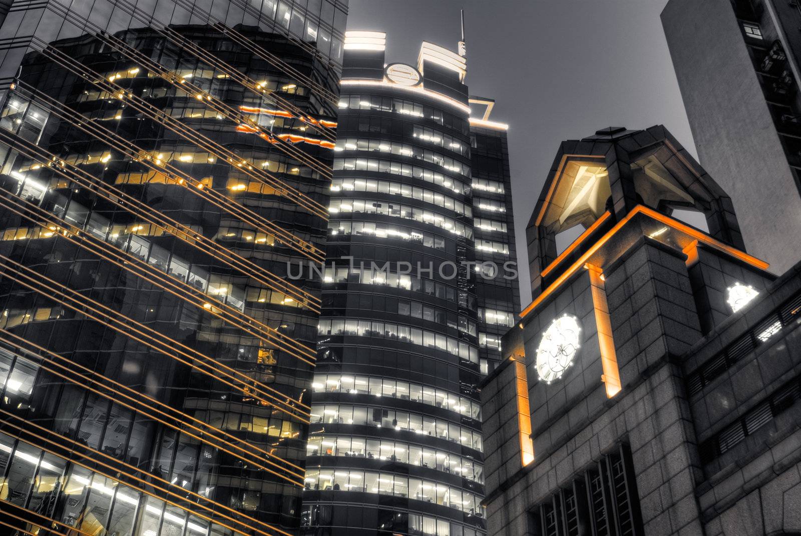 Office night with building and tower in modern city in Hong Kong.