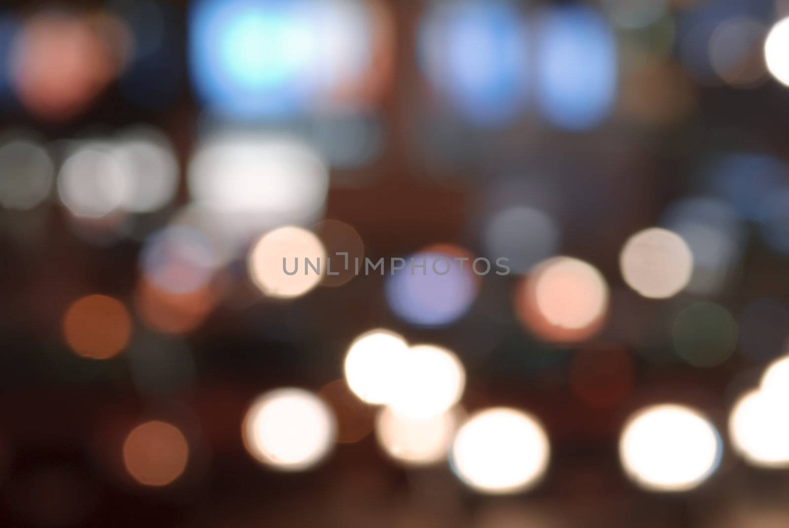 Background of color spot of lens blurred.