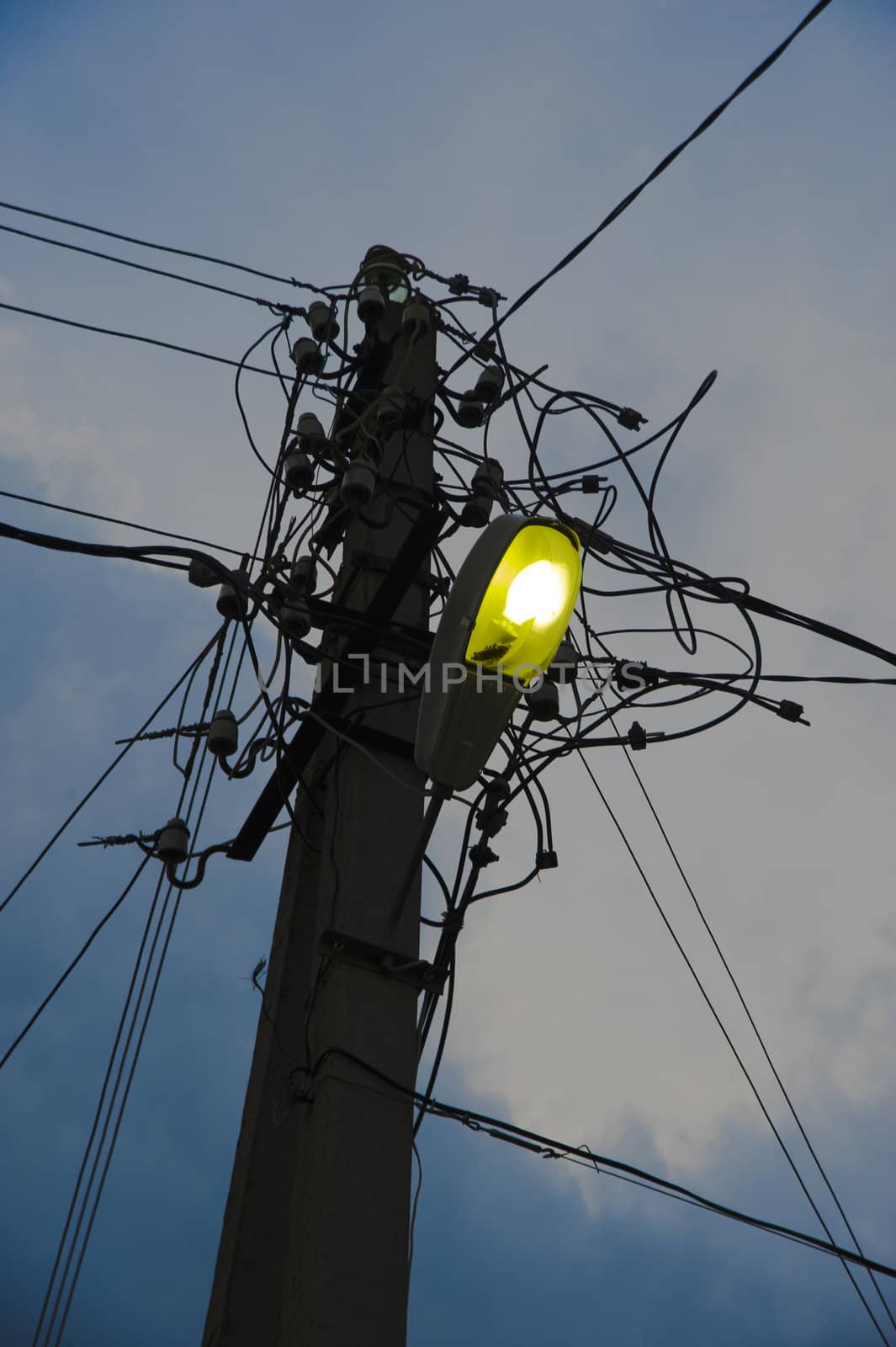 High voltage power lines in the evening time