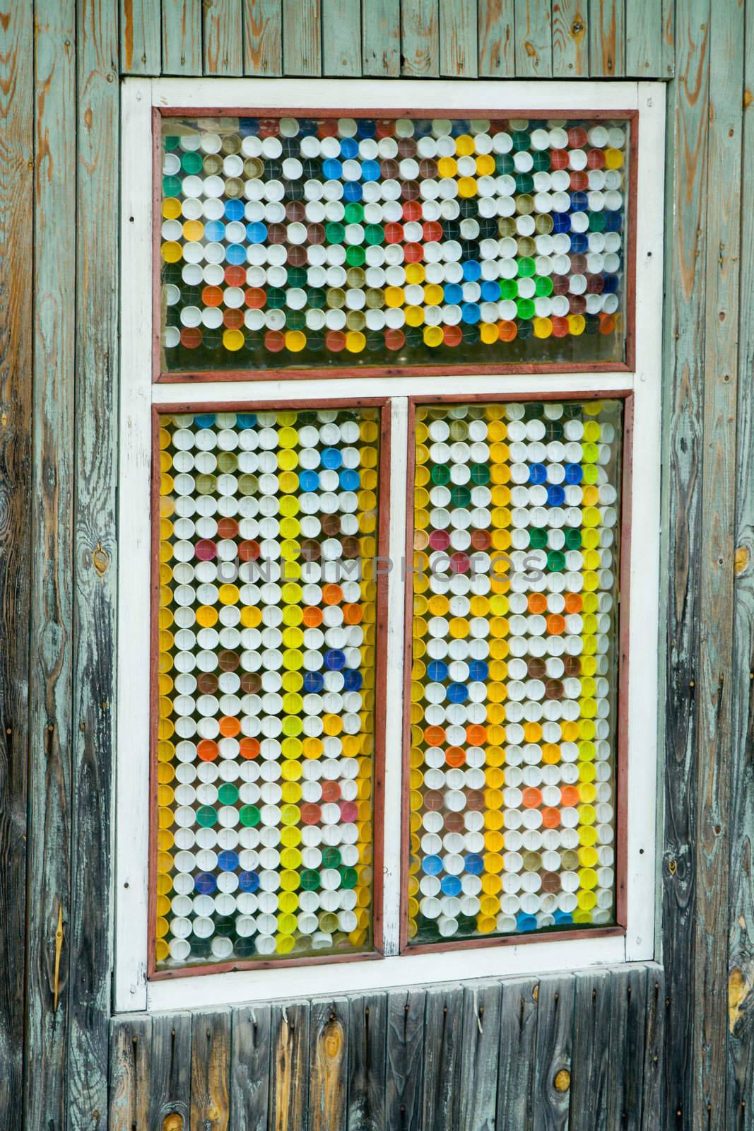 Old window decorated by fuses
