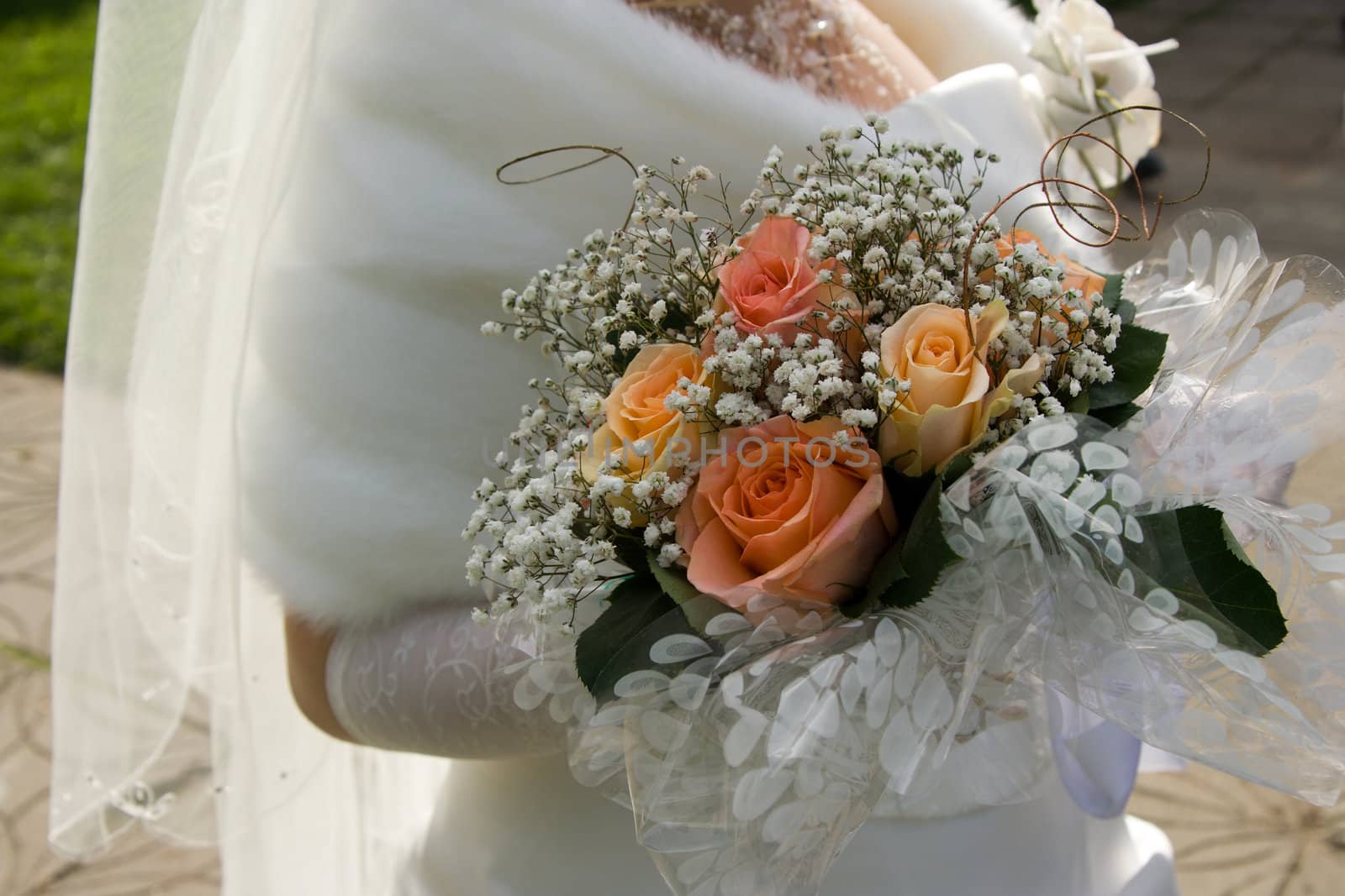 Wedding bouquet in hands of the bride