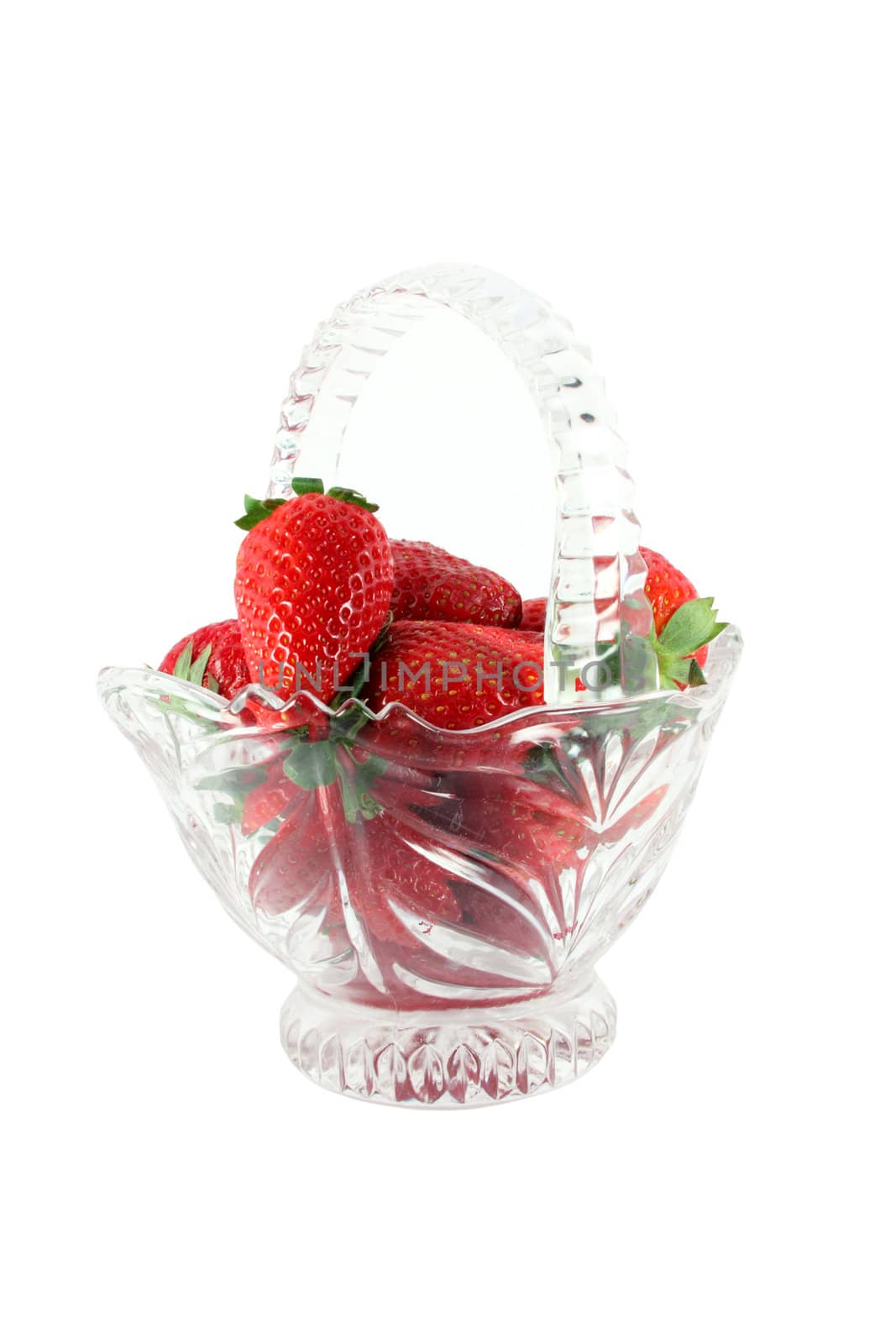 Strawberries in a glass basket isolated on white