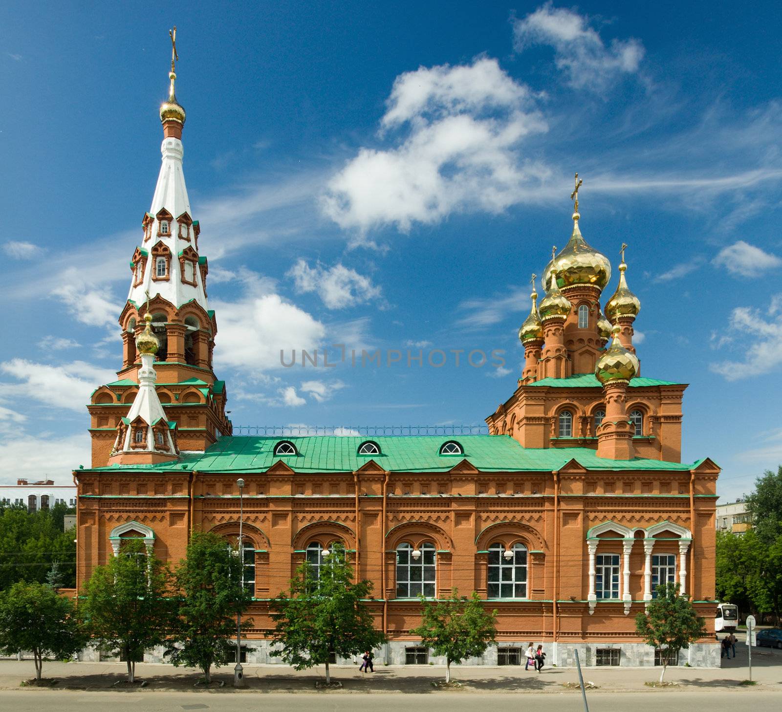 Christian temple with domes on a background of clouds