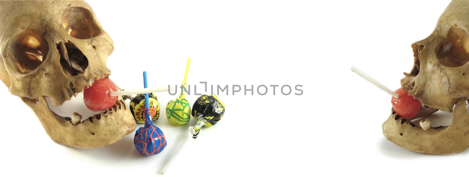 an image of skulls and lollipops for Halloween
