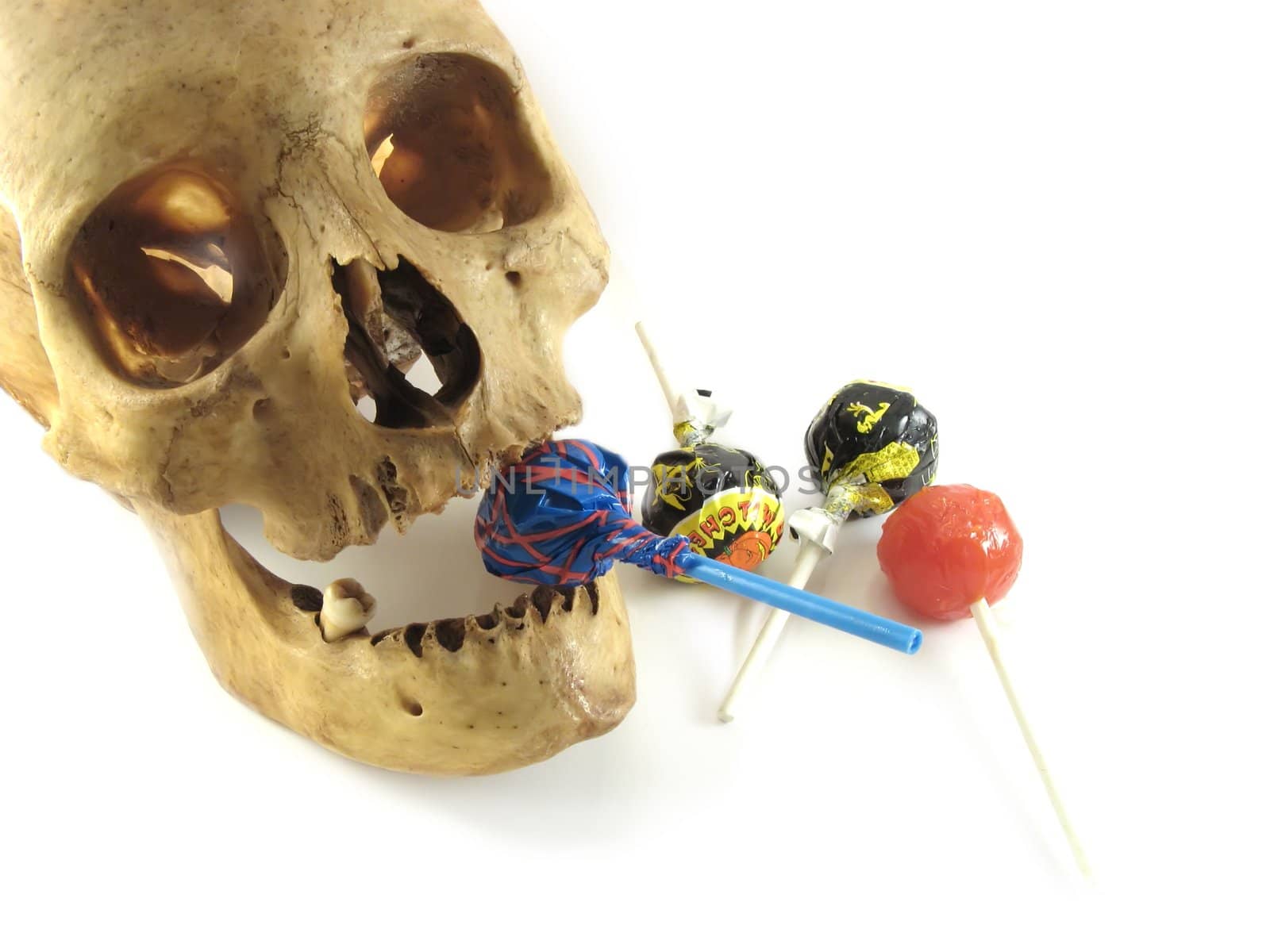 an image of skull and lollipops for Halloween