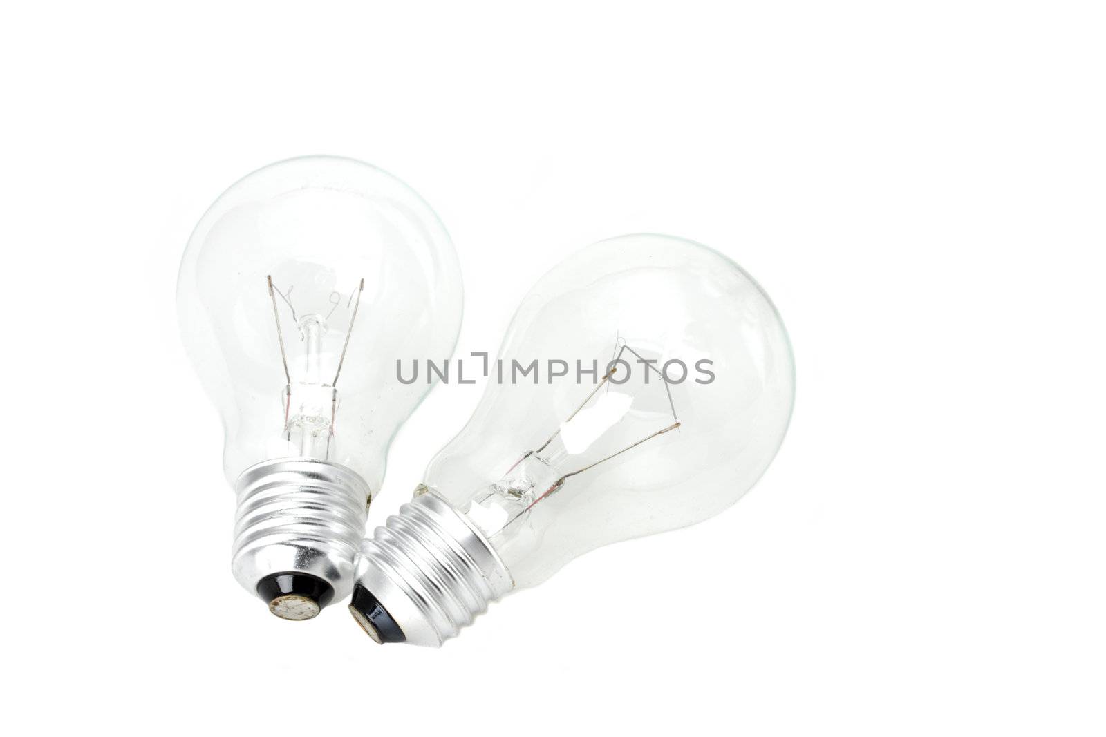 two conventional light bulbs on white background by bernjuer