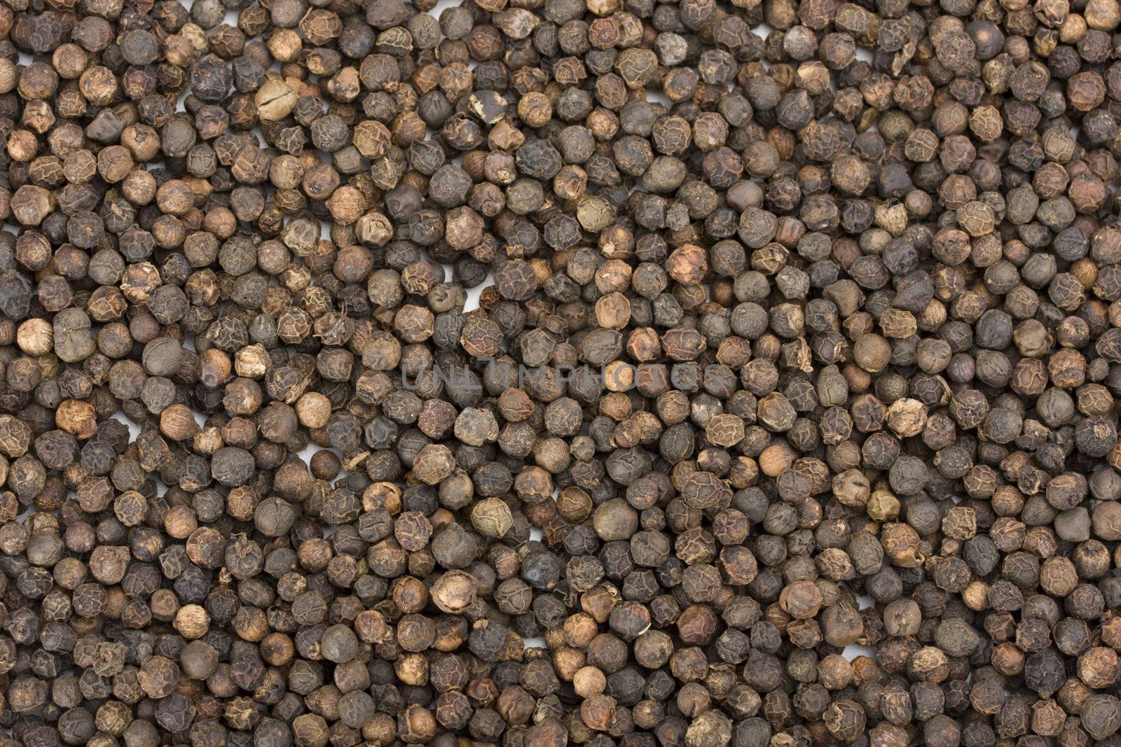 a lot of peppercorns useful as background by bernjuer