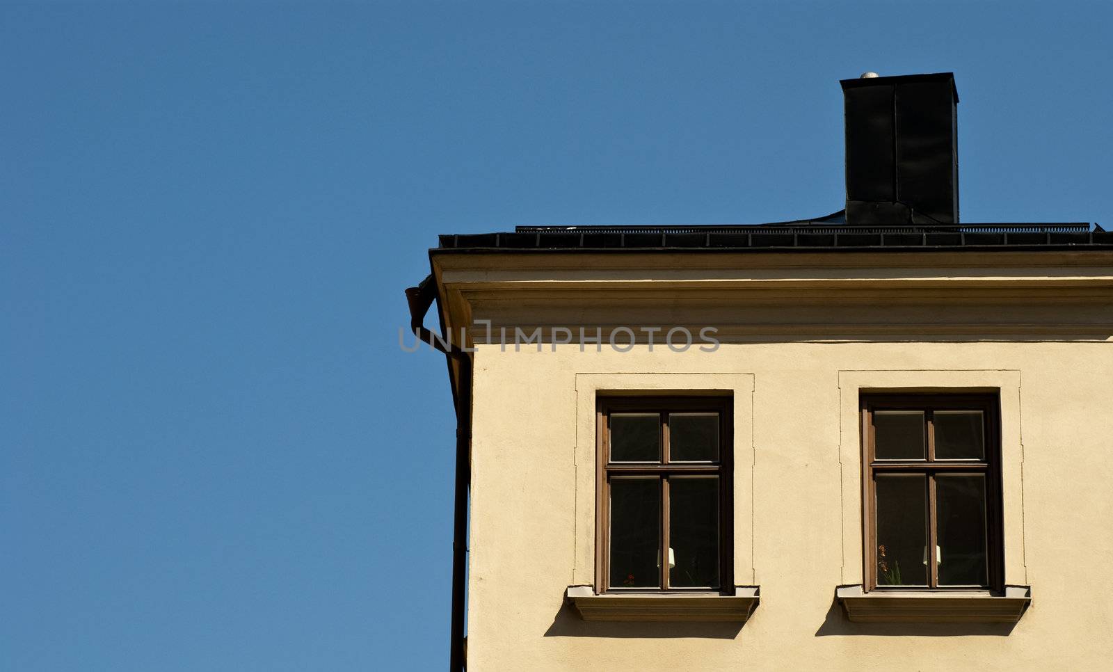 Detail of a residential house with blue sky